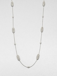 EXCLUSIVELY AT SAKS.COM. A brilliant piece with stylized oval stations on a delicate link chain. CrystalsRhodium-plated brassLength, about 36Lobster clasp closureImported 