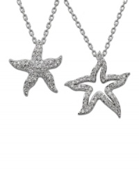 Spruce up your summer wardrobe with a little nautical shine. Swarovski's double starfish pendant features one cut-out and one solid starfish decorated in glittering round-cut crystals. Crafted in silver tone mixed metal. Approximate length: 15 inches. Approximate drop: 1-1/4 inches.