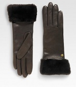 Durable deerskin leather accented with luxurious cashmere lining and shearling sheepskin cuff.Metal logo detailAbout 11 longSpecialist dry cleanImportedFur origin: Spain