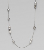 From the Elements Collection. Luminous South Sea pearls and carved sterling silver beads are stationed on an elegant strand of sterling silver. Gorgeous worn either super long or doubled up.South Sea pearl Sterling silver Length, about 48 Lobster Clasp Imported