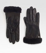 Supple leather accented with luxurious cashmere lining, shearling sheepskin cuff and touch technology for easy access to touchscreen electronics.About 9 longCashmere liningShearling cuffProfessional leather cleanerImported