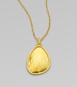 From the Elements Collection. A free-form disc of hammered 24k gold glows warmly as it hangs from a bold gold chain.24k yellow goldChain length, about 18Pendant length, about 1Hook claspImported