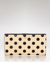 Upgrade your everyday wallet to this kate spade new york design. A shining on-duty choice crafted of patent leather, its snap closure opens to an interior that will keep you organized in style.