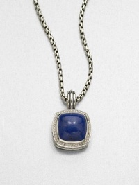 From the Albion Collection. A lapis cabochon set in sterling silver accented with brilliant diamonds on a bale. LapisDiamonds, .48 tcwSterling silverSize, about .66ImportedPlease note: Chain sold separately. 