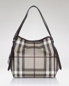 This modern tote in Burberry's iconic check makes a chic statement work or weekend.