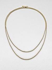 A baby box chain necklace in radiant 18k gold. 18k goldLength, about 32Lobster clasp closureImported 