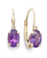 Sparkling perfection. Add a vibrant pop of color to your look with oval-cut amethyst (3/4 ct. t.w.) and sparkling diamond accents. Crafted in a 14k gold leverback setting. Approximate drop: 3/4 inch.