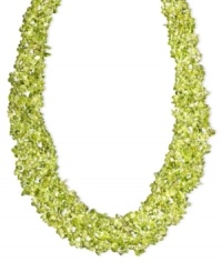 Add a layer of earthy green hues to your neckline. This vivid necklace features layers of peridot gemstone chips (4-6 mm) and a 14k gold toggle clasp. Approximate length: 20 inches.