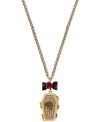 Think outside the box with this coffin pendant necklace from Betsey Johnson. Crafted from gold-tone mixed metal and featuring bow and flower details, as well as glass crystal accents, the necklace buries conventional notions of style. Approximate length: 35 inches + 3-inch extender. Approximate drop: 2-1/3 inches.