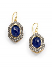 THE LOOKNouveau CollectionBlue corundum and cubic zirconia accents22k yellow goldplated and black ruthenium-plated wave settingHook backTHE MEASUREMENTLength, about 1½ORIGINImported