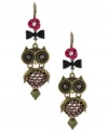 All eyes will be on you with these whimsical owl drop earrings from Betsey Johnson. Crafted from gold-tone mixed metal, the earrings feature glass crystal accents in shades of purple for a colorful touch. Approximate drop: 2-1/2 inches.