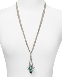 A bold gemstone pendant on this ABS by Allen Schwartz necklace adds interest to edge right metallic links.