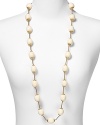 RJ Graziano channels '40s-inspired chic with this beaded necklace. Egg-shaped ivory beads capped with gold tone hardware blend elegantly with a range of looks.