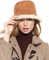 Opt for adorable accessorizing this winter with this impossibly chic shearling hat from Surell that keeps you cozy and on-trend.