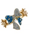 A perfect fit to be tied, this two-row bangle bracelet from Betsey Johnson is crafted from antique gold-tone mixed metal. Blue glitter and glass crystal accents add sparkle, with gold-tone stars enhancing the lustrous effect. Approximate diameter: 4 inches.