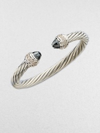 From the Cable Collection. Two beautifully, faceted hematite stone caps accented with dazzling diamonds on a sterling silver cable cuff. HematiteDiamonds, .48 tcwSterling silverDiameter, about 2½Slip-on styleImported 