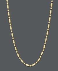 Dazzle your neckline with a little extra texture. Necklace features a unique dot dash design crafted in 14k gold. Approximate length: 24 inches.