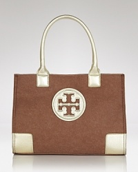 Tory Burch's signature tote is sized down for the smaller-scale daytime demands, updated in felt with leather trims.