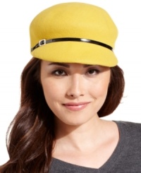 Here's the scoop: this newsboy cap from Nine West is the perfect companion for easy-going style. Soft wool felt is accented with a faux patent leather band with buckle detail, for a look that's fabulously front page.