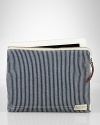 Drawing inspiration from vintage railroad uniforms, this lined cotton case holds your tablet in cool, laid-back style.