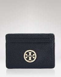 A poised piece for any girl on the go, this leather Tory Burch card case has four easy-access slots for your cards.