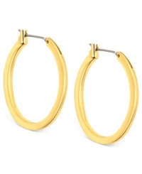 Embrace the oval shape of these hoop earrings from Anne Klein. Crafted from gold-tone mixed metal, the pair puts a stylish twist on a classic silhouette. Approximate diameter: 3/4 inch.