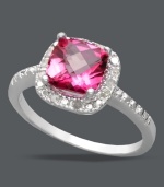 Sparkle in her favorite color. Victoria Townsend's dynamic statement ring highlights a cushion-cut pink topaz (1-3/4 ct. t.w.) edged by sparkling, round-cut diamonds (1/10 ct. t.w.). Set in sterling silver. Size 7.