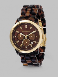 Tortoise shell design adds elegance to a chronograph style with shiny gold IP accents, bringing true luxury just a little bit closer to your wrist. Japanese analog movement Waterproof up to 5 ATM 40mm case with IP (ionic plating) gold elements Chocolate brown mother-of-pearl dial Three chronograph sub dials Round face Stone double indexes Second hand Acrylic tortoise shell bracelet Imported