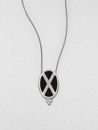 From the Soho Collection. Rich black spinels accented with a white sapphire criss cross design set in sterling silver on a delicate link chain. Black spinel and white sapphireSterling silver Length, about 16Pendant size, about 1.2Lobster clasp closureImported 