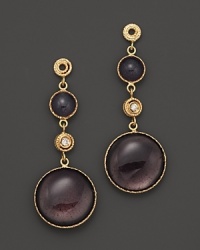 Sparkling diamonds highlight these drop earrings in bold grey enamel and 18K yellow gold.