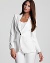 Cut a chic silhouette in this expertly tailored Burberry London blazer. A sleek, simple fit ensures timeless style.