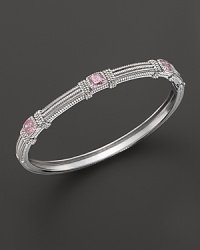 Pink crystal cushion stones decorative a timeless sterling silver bangle from Judith Ripka.