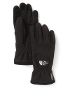 Beat the chill with these cozy fleece gloves from The North Face® featuring cinching at the wrist and palm and fingertip patches.