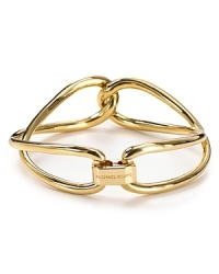 Michael Kors elegantly entwined bangle makes a modern token of love.