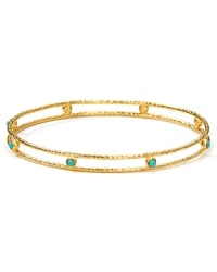 Embrace the season's eclectic approach to accessorizing with this layered gold-plated bangle from Melinda Maria, adorned with striking turquoise-colored stones. Its delicate design will make a perfect addition to your jewel box.