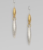 From the Wheat Collection. Two daggers, one 24k yellow gold, one sterling silver, are connected by a single ring.Sterling silver 24k yellow gold Drop, about 2¼ Ear wire Imported