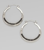 From the Eclipse Collection. Elegant hoops with an arc of faceted deep blue sapphires set in polished sterling silver.Blue sapphireSterling silverDiameter, about 1¾ PiercedImported