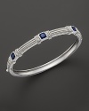 Blue corundum cushion stones decorative a timeless sterling silver bangle from Judith Ripka.