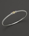 Two hearts flank a faceted canary crystal on this slim bangle with white sapphires.