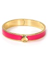 Solo or stacked, kate spade new york's enamel bangle makes a subtle statement. Style yours with a clean white blouse--roll up the sleeves to make this piece pop.