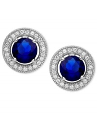 Make yourself the center of attention in CRISLU's drop earrings. Hand-cut, faceted clear cubic zirconias surround a round-cut sapphire-colored cubic zirconia (2-1/7 ct. t.w.) Set in platinum over sterling silver. Approximate drop: 2/5 inch.