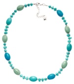 Stylishly Southwestern. Reconstituted turquoise beads adorn this eye-catching necklace from Lauren Ralph Lauren. Whether you wear it to work or with more casual daytime outfits, it's sure to stand out as a chic complement. Crafted in mixed metal. Approximate length: 18 inches + 2-inch extender.