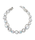 No matter what the occasion, add sparkle to your look with Swarovski's glimmering rhinestone bracelet. Made in silver tone mixed metal, it features an array of asymmetrical crystals. Approximate length: 7 inches.