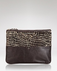 Pouch your bets with this Rebecca Minkoff accessory, designed to send a texture message in calf hair with leather trims.