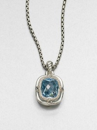 From the Labyrinth Collection. A stunning, faceted blue topaz stone surrounded by sparkling diamonds set in sleek sterling silver on an iconic cable bale. Blue topazDiamonds, .45 tcwSterling silverSize, about .7Fixed baleImported Please note: Chain sold separately. 