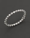 Gleaming 14K white gold, lovely alone or perfect for stacking.