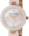 Anne Klein Women's AK/1314RGLP Ceramic Swarovski Crystal Accented Pink Bangle Watch