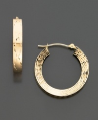 A diamond-cut pattern and textured details make these hoop earrings a standout. Crafted of 14k gold.