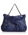 Get the look of luxe with this gorgeous shoulder bag by Ivanka Trump. Polished pleats and a knotted front detail puts a unique spin on this classic silhouette.