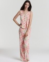 Show off your girly side in a floral print tank and pant pajama set with ruffle trim.